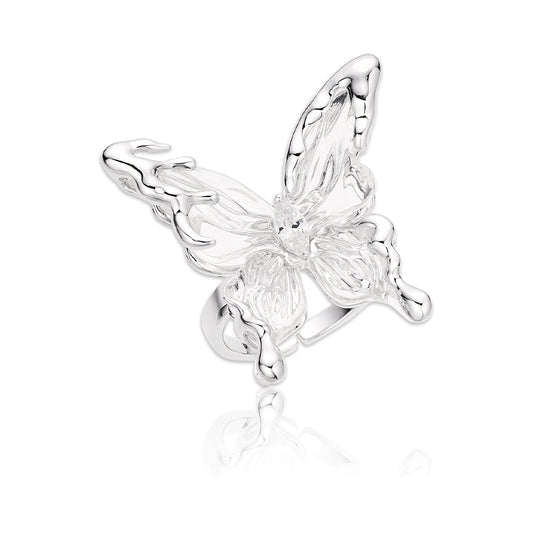 Elegant transparent butterfly earrings by SUN HUNTER featuring intricate design and sparkling accents