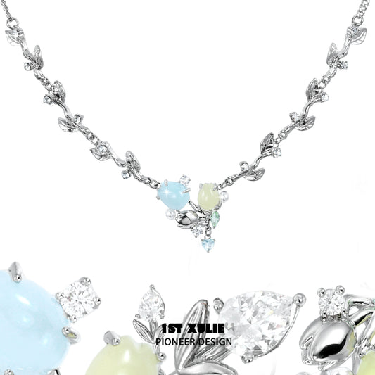 Elegant tulip clavicle necklace featuring gemstones in pastel colors and intricate silver design