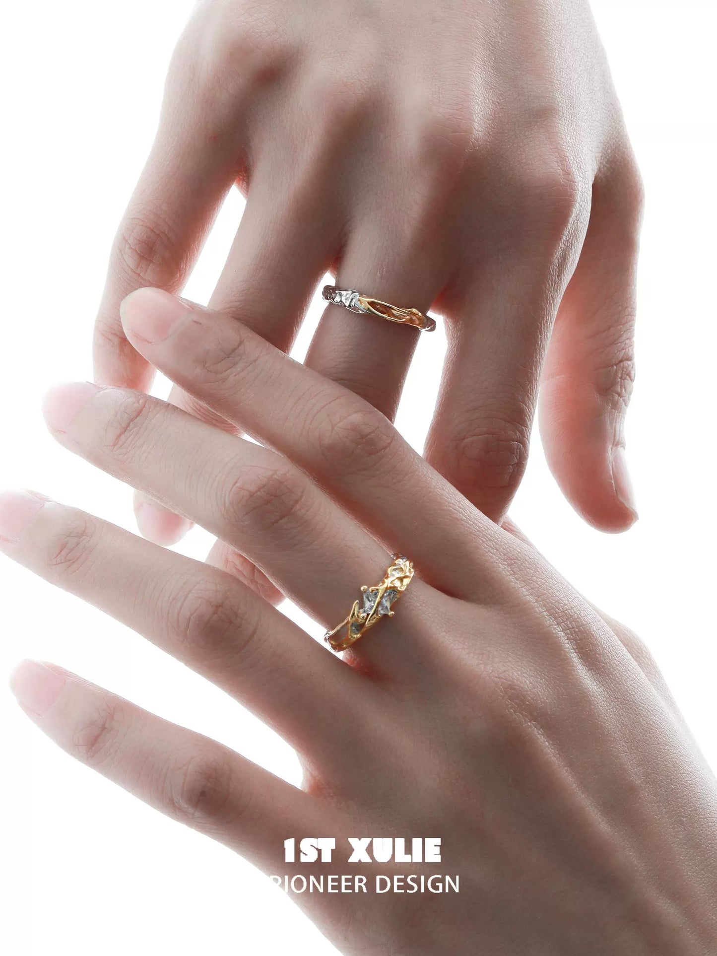 Unique couple rings designed by 1ST XULIE, featuring intricate details and a modern style