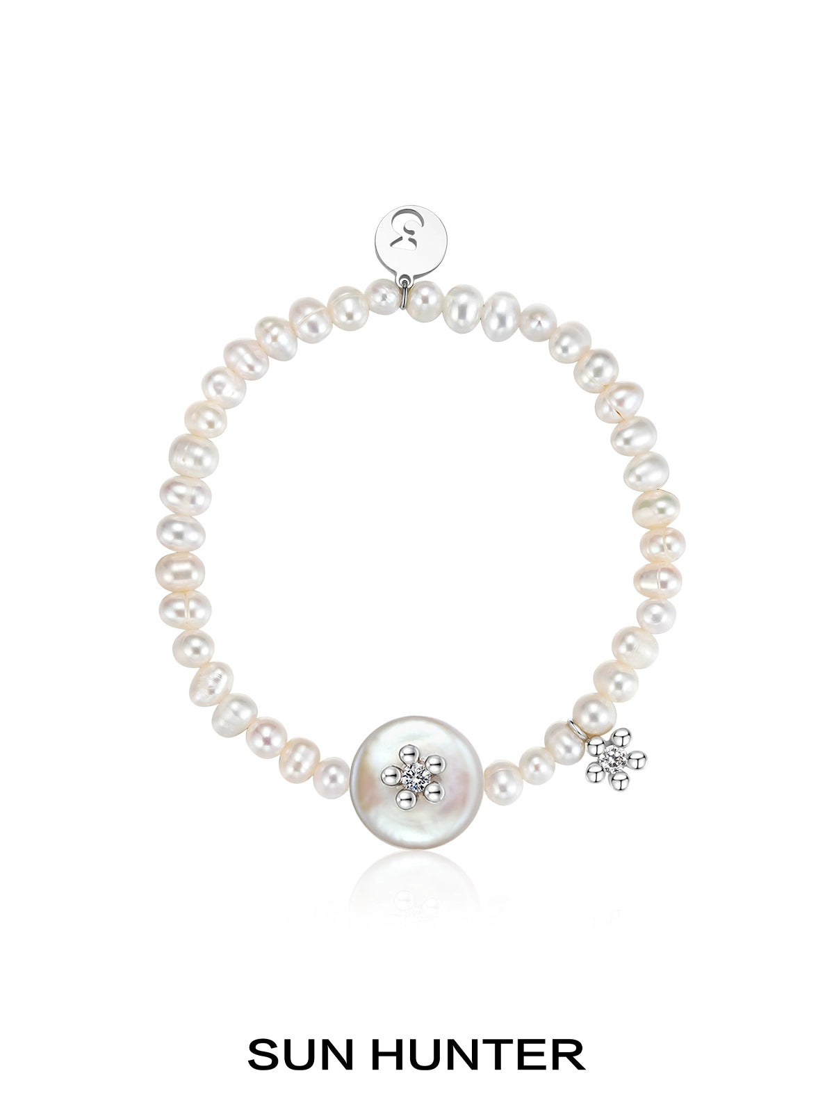 SUN HUNTER unique pearl bracelet featuring a large centerpiece and sparkling accents