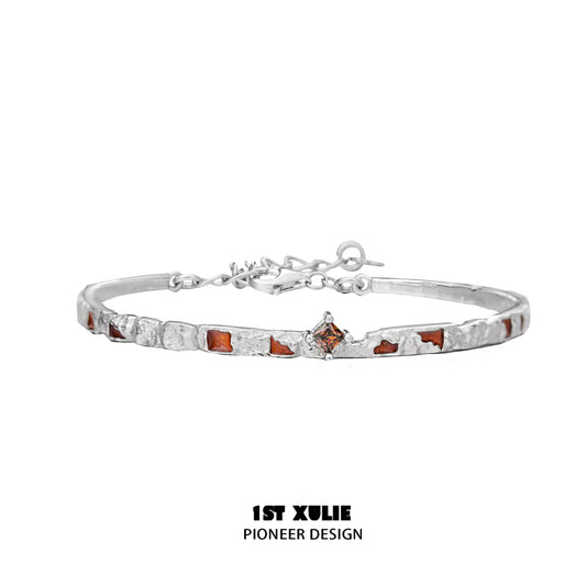 Unique silver bracelet for women featuring a blend of textured and smooth designs