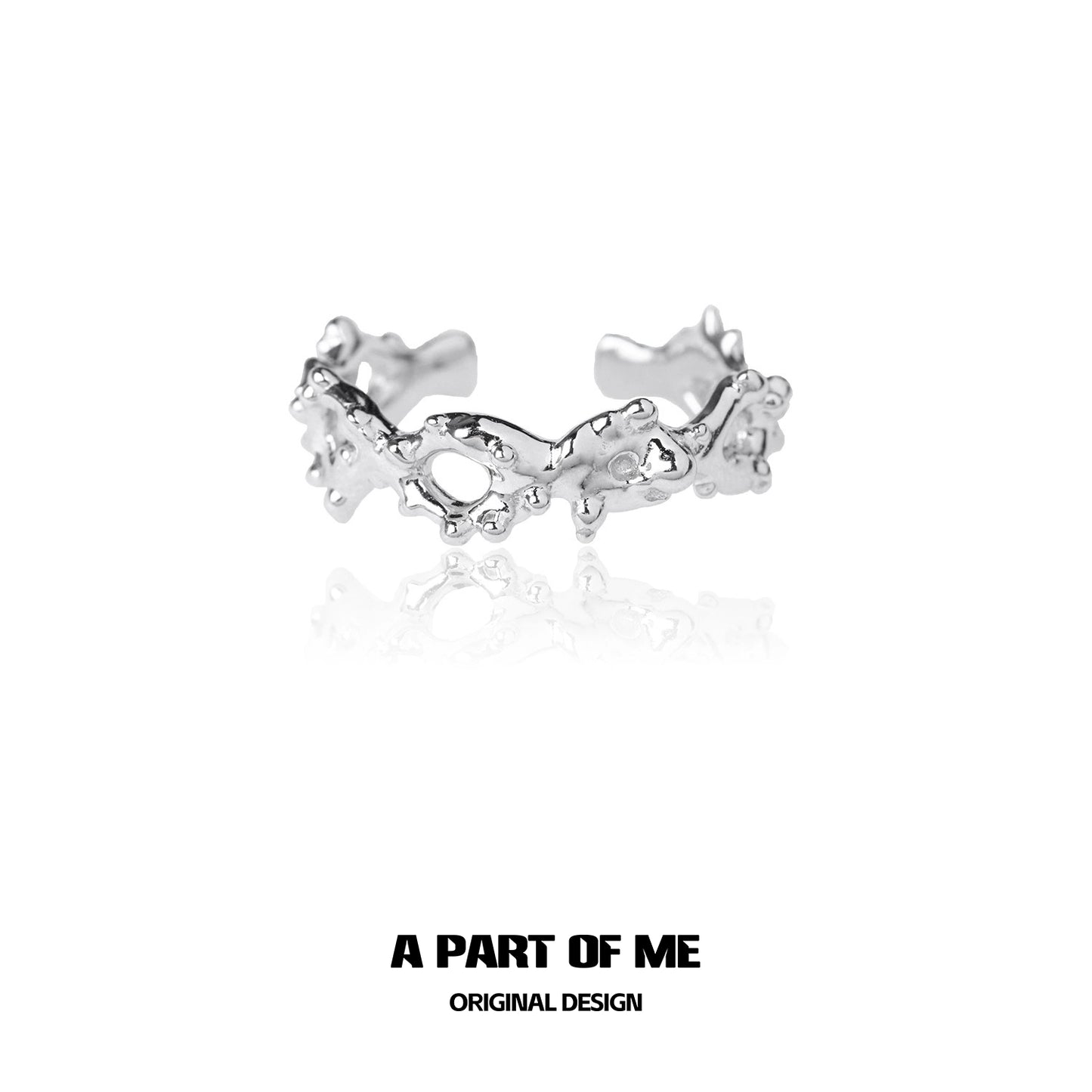 Unique silver ring by A PART OF ME featuring an artistic design with textured details