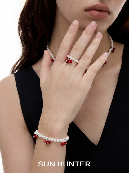 Elegant SUN HUNTER velvet cherry pearl ring with matching jewelry for a stylish look