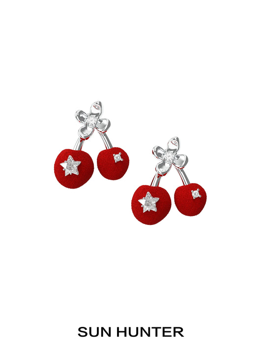 SUN HUNTER velvet cherry stud earrings with sparkling star details for a playful look