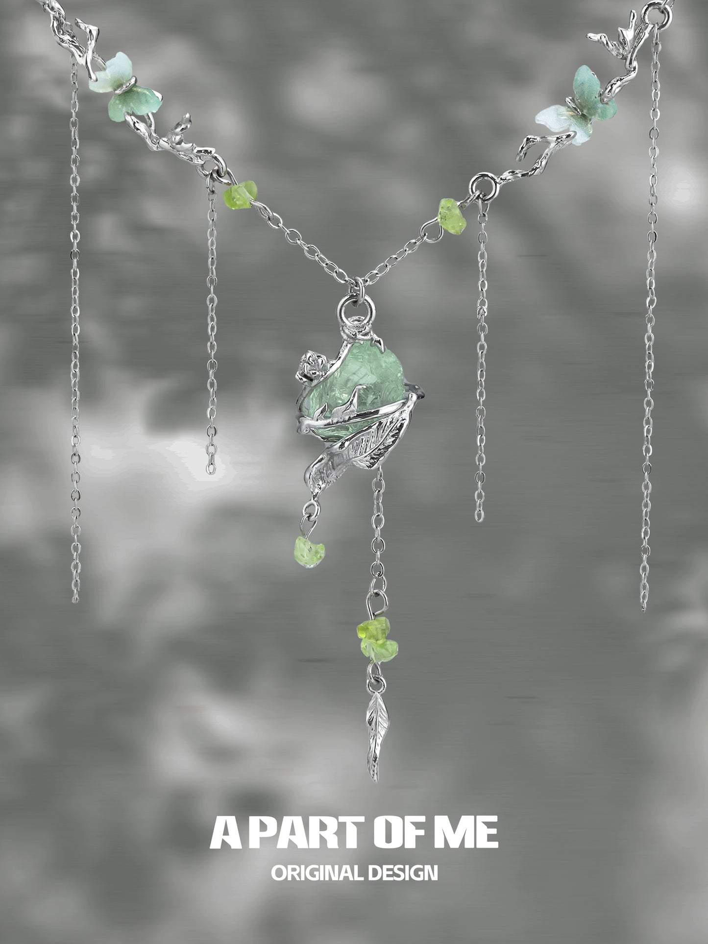 A PART OF ME forest fairy fluorite necklace featuring silver chain, delicate charms, and colorful gemstones
