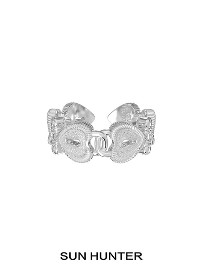 Silver SUN HUNTER love lock chain ring featuring heart-shaped designs and a stylish finish