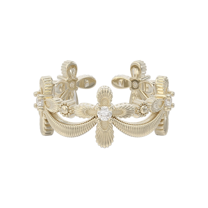 Elegant SUN HUNTER shimmer cross ring featuring intricate floral designs and sparkling accents