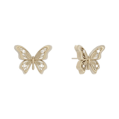 Elegant vintage butterfly earrings in gold tone with intricate detailing and a classic design