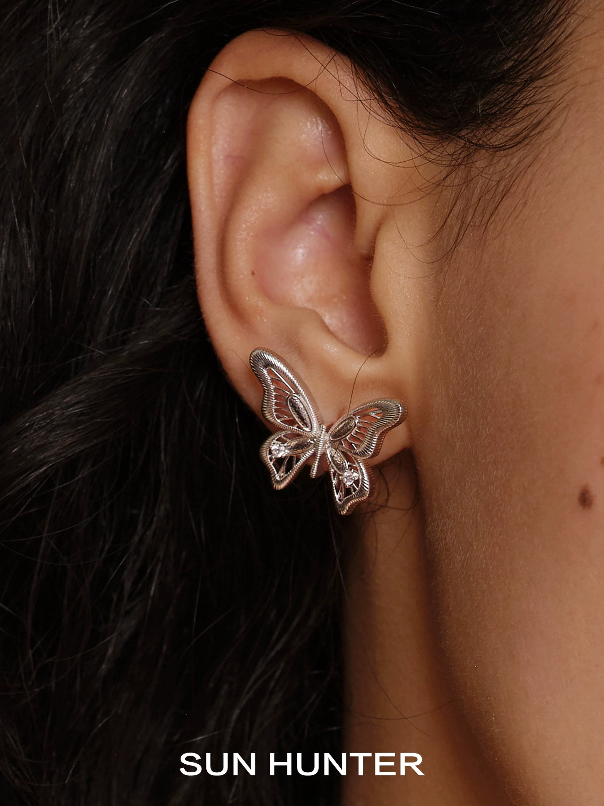 Elegant vintage butterfly earrings by SUN HUNTER showcasing intricate butterfly design