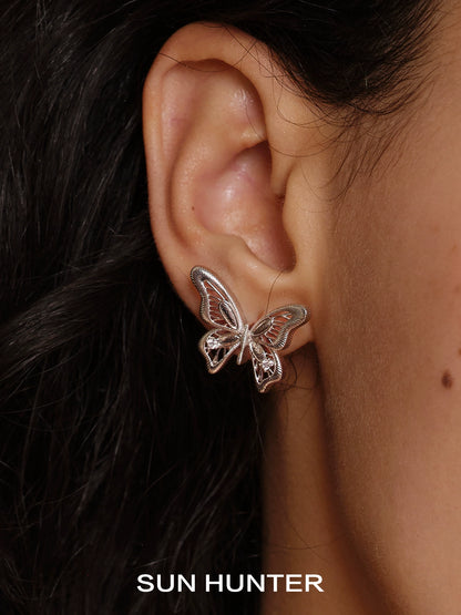 Elegant vintage butterfly earrings by SUN HUNTER showcasing intricate butterfly design