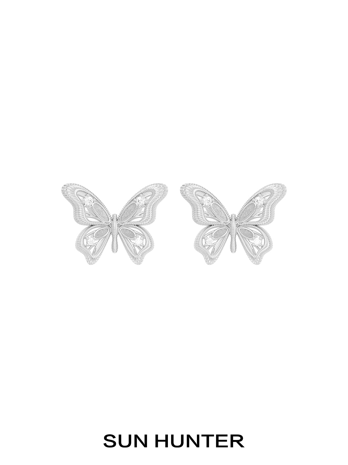 SUN HUNTER vintage butterfly earrings in silver, featuring intricate detailing and elegant design