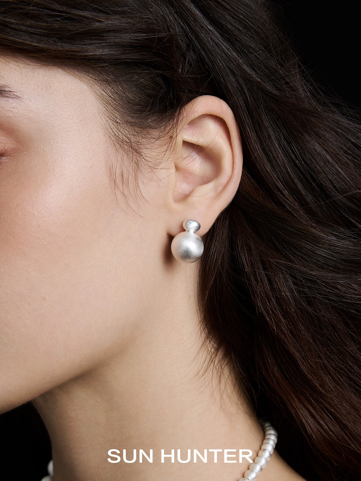 Elegant vintage cocoon earrings by SUN HUNTER, featuring a stylish design perfect for any occasion