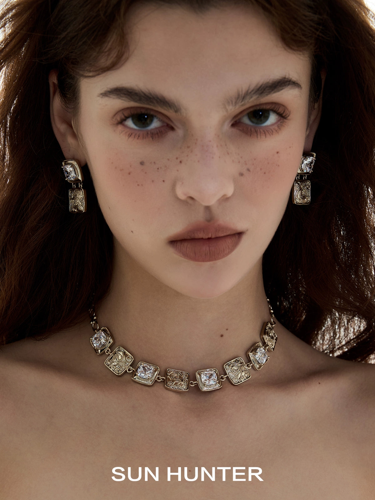 SUN HUNTER vintage coin earrings paired with a matching necklace for a chic look