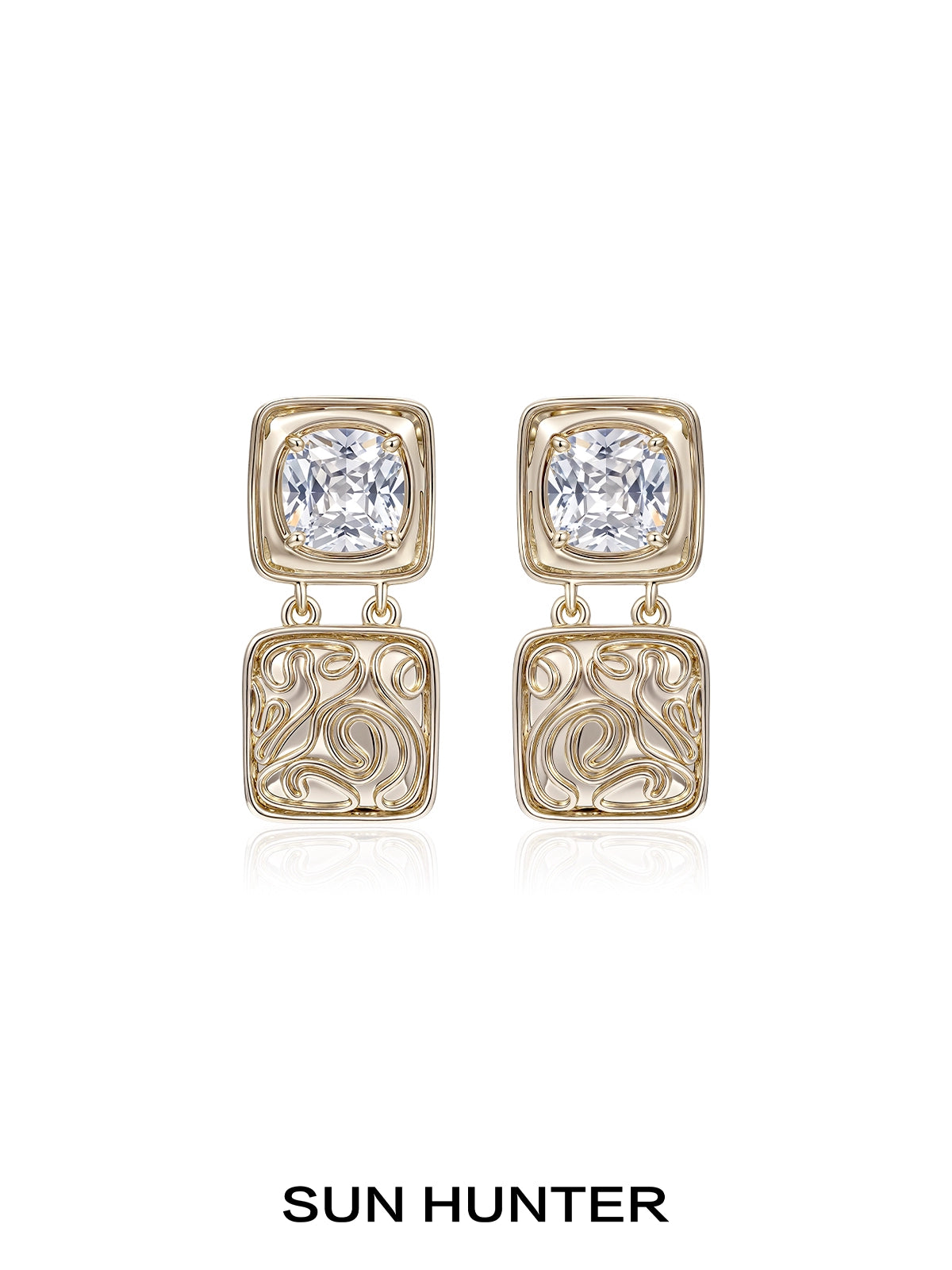 Elegant SUN HUNTER vintage coin earrings with decorative design and sparkling gemstones