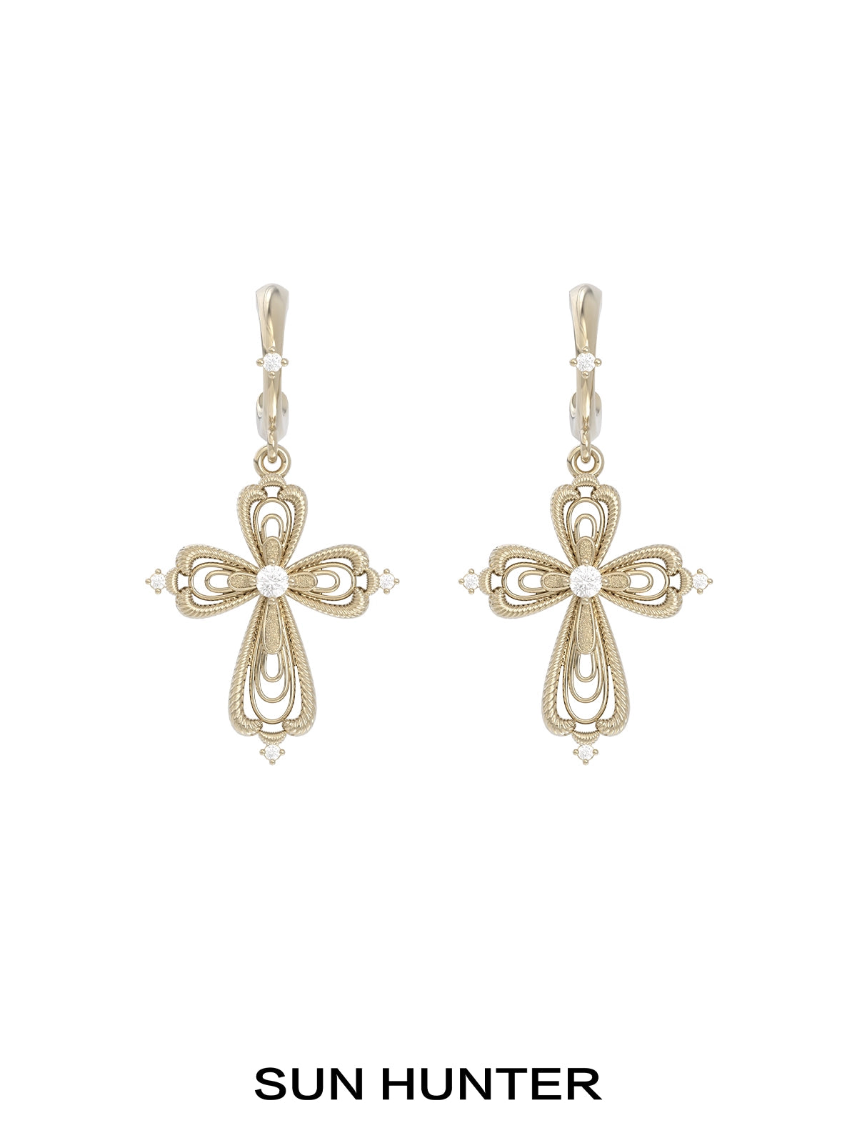 Elegant SUN HUNTER vintage cross earrings featuring intricate designs and sparkling accents