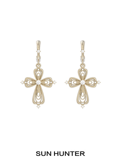 Elegant SUN HUNTER vintage cross earrings featuring intricate designs and sparkling accents