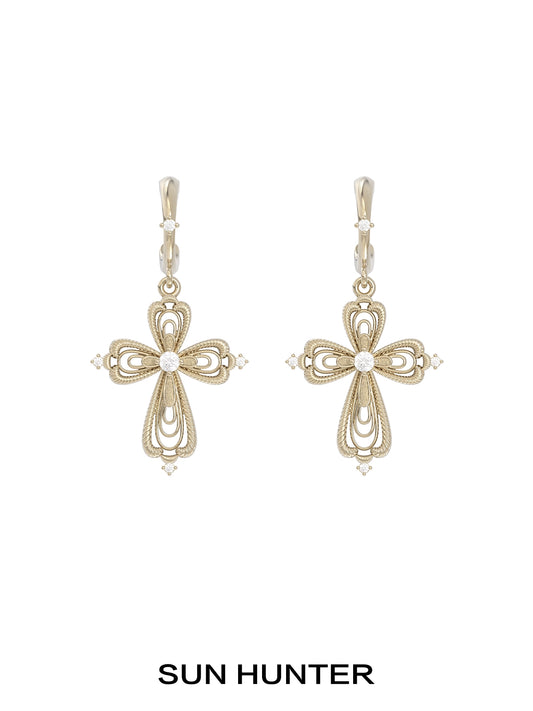 Elegant SUN HUNTER vintage cross earrings featuring intricate designs and sparkling accents