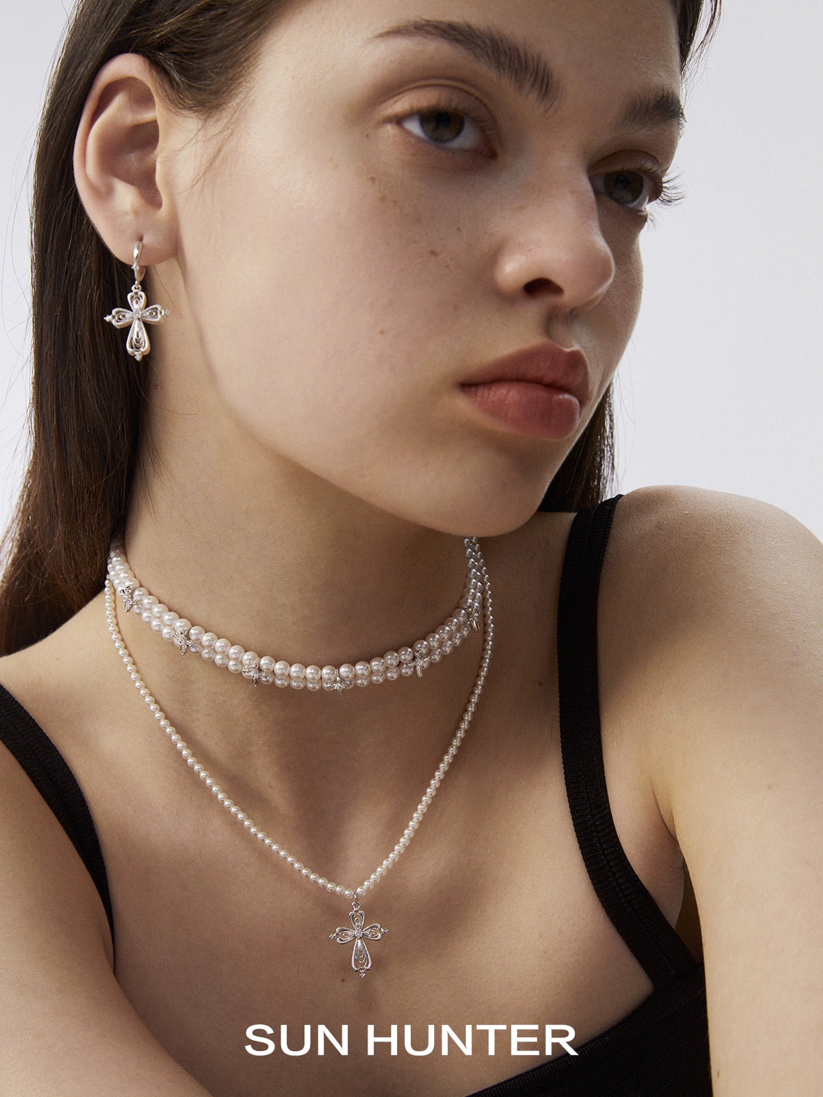 SUN HUNTER vintage cross earrings with elegant design, perfect for stylish accessorizing