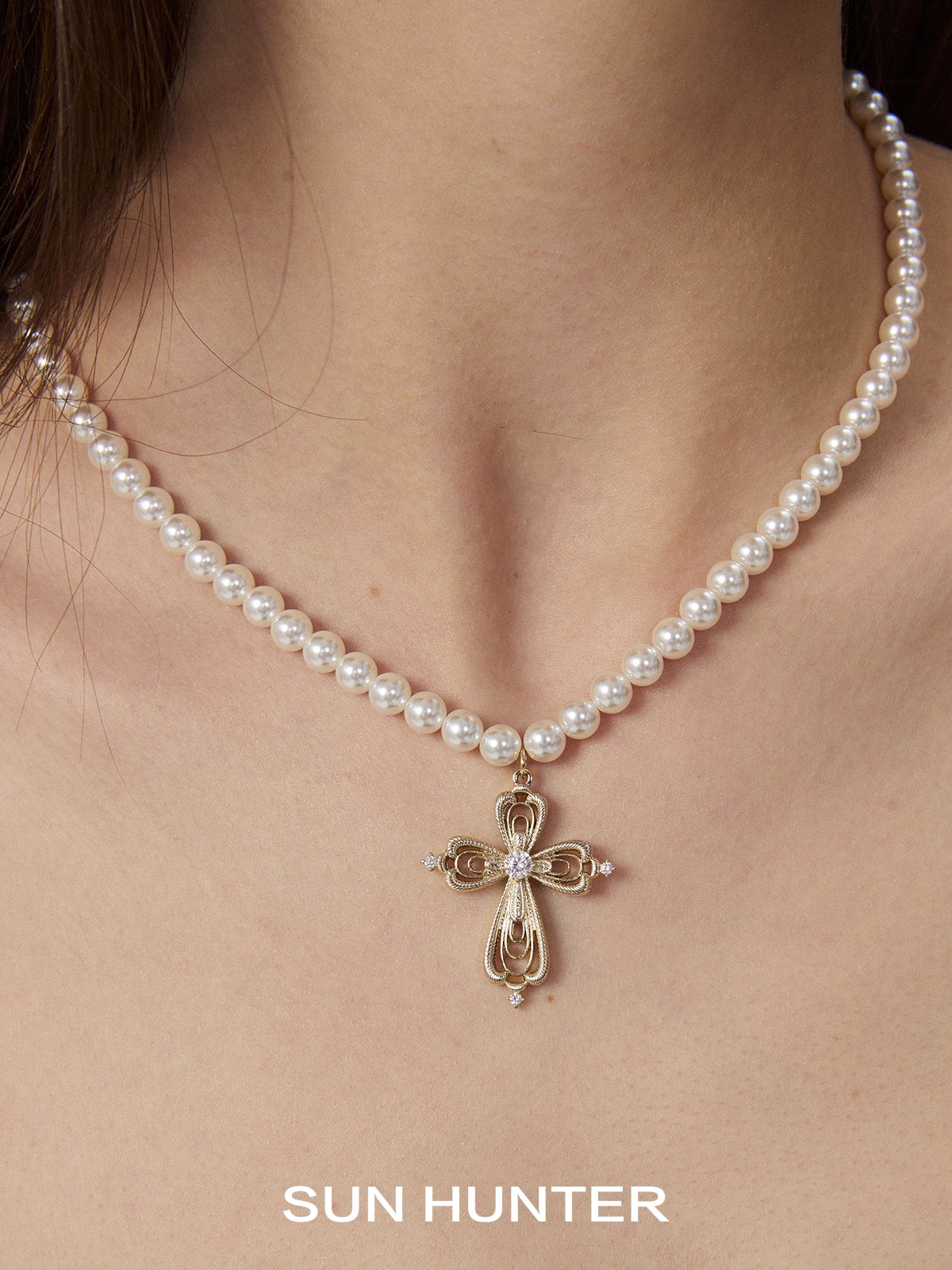 SUN HUNTER vintage cross pearl necklace with a delicate cross pendant and pearl strand