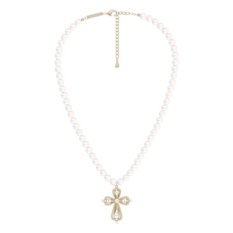 Vintage cross pearl necklace featuring a decorative cross pendant on a pearl strand