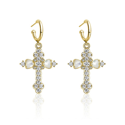 Golden vintage cross zircon earrings featuring sparkling stones and a charming design