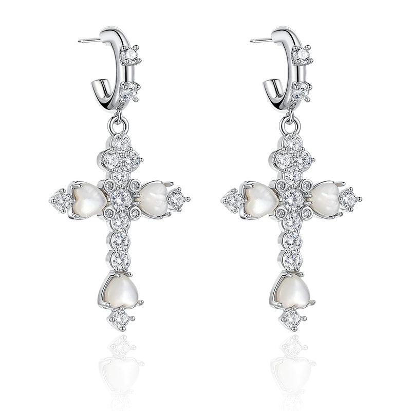 Elegant vintage cross zircon earrings featuring sparkling details and a unique design