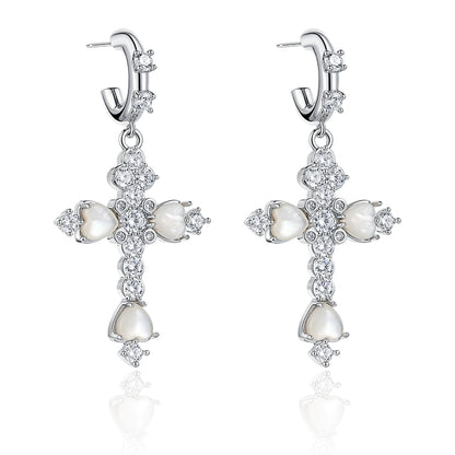 Elegant vintage cross zircon earrings featuring sparkling details and a unique design
