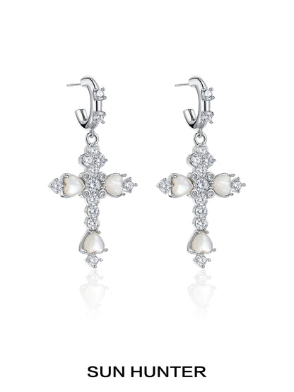 Elegant SUN HUNTER vintage cross zircon earrings with pearl accents and sparkling details