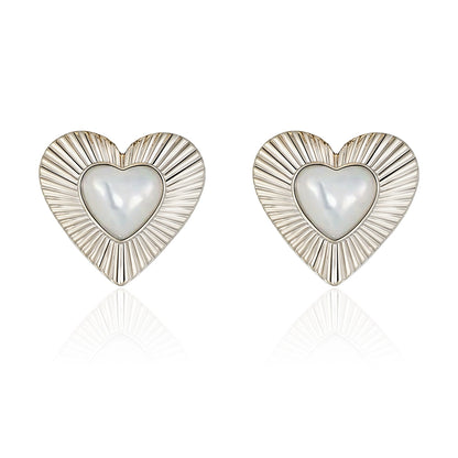 SUN HUNTER vintage heart stud earrings with radiant design and pearl center for elegant style