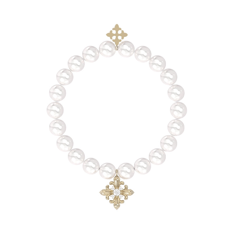 Elegant vintage iris pearl bracelet with a decorative gold charm for a timeless look