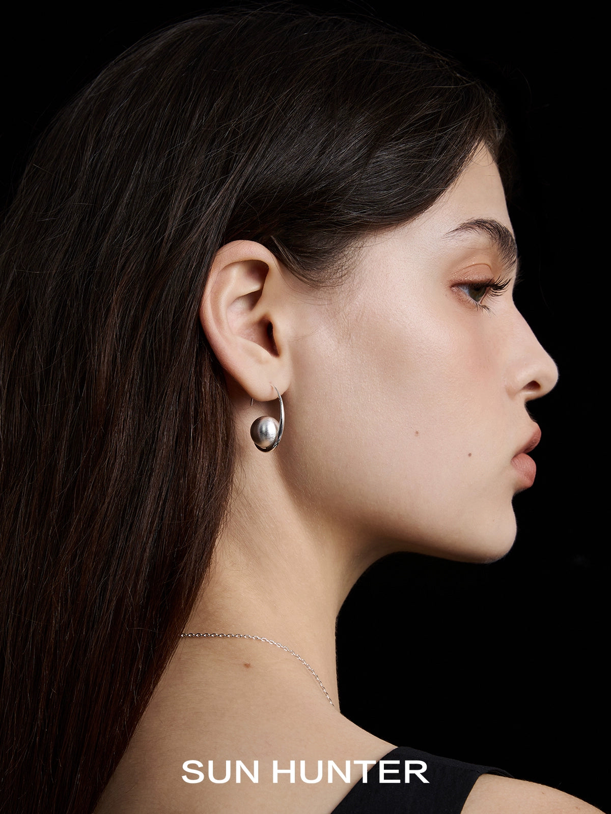 Elegant vintage orbital earrings from SUN HUNTER styled with a sleek design for timeless fashion