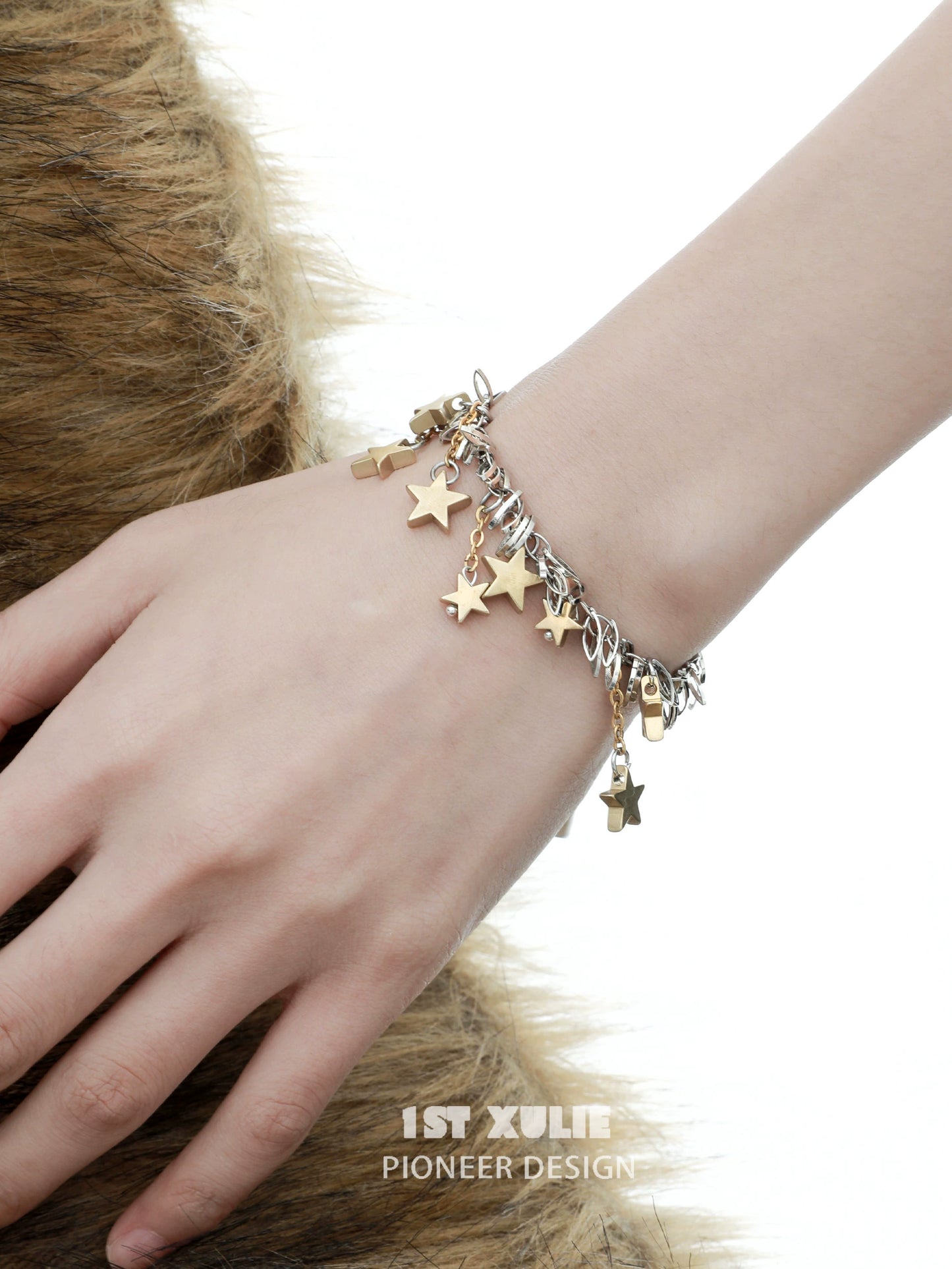 Vintage star tassel silver bracelet featuring multiple dangling star charms for a stylish look