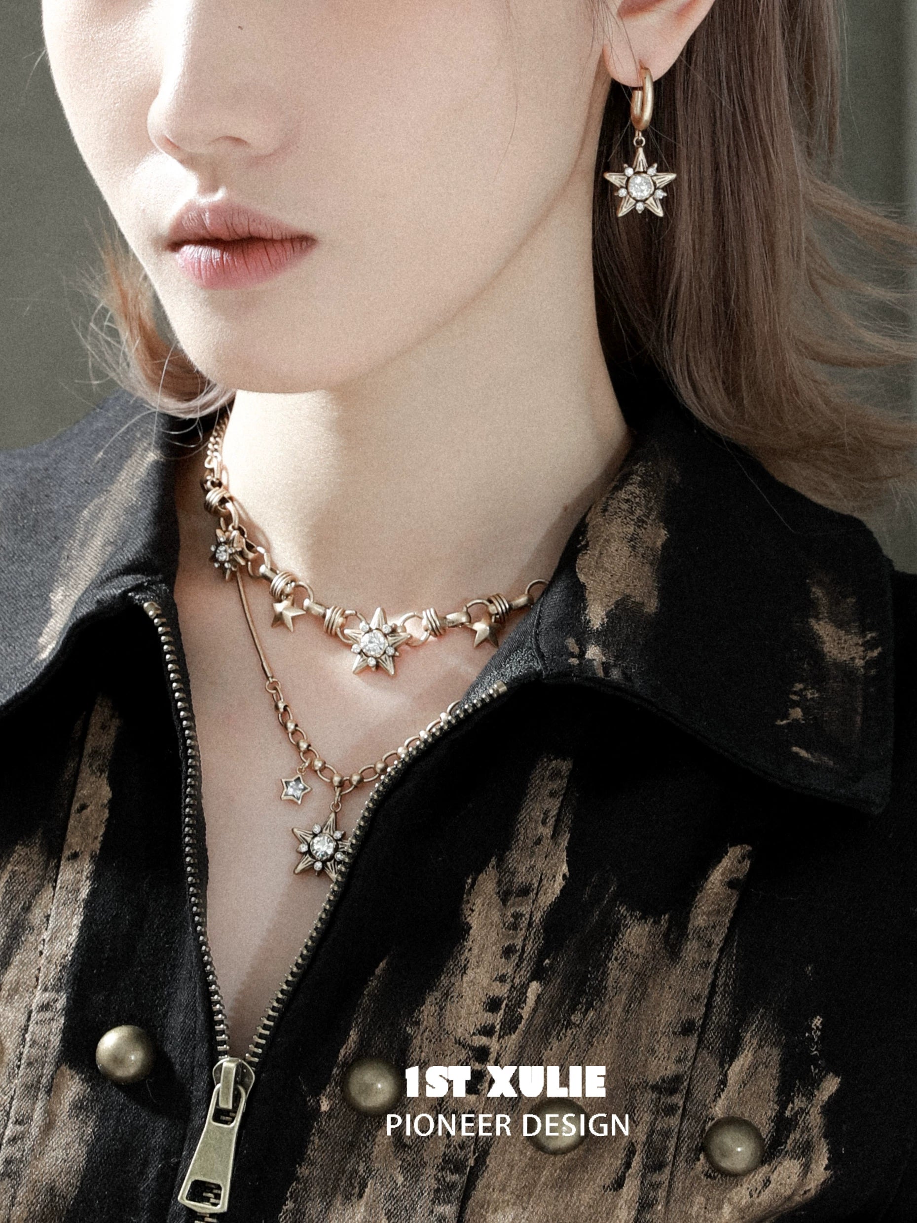 Elegant vintage starlight pendant necklace displayed with matching earrings for a chic look