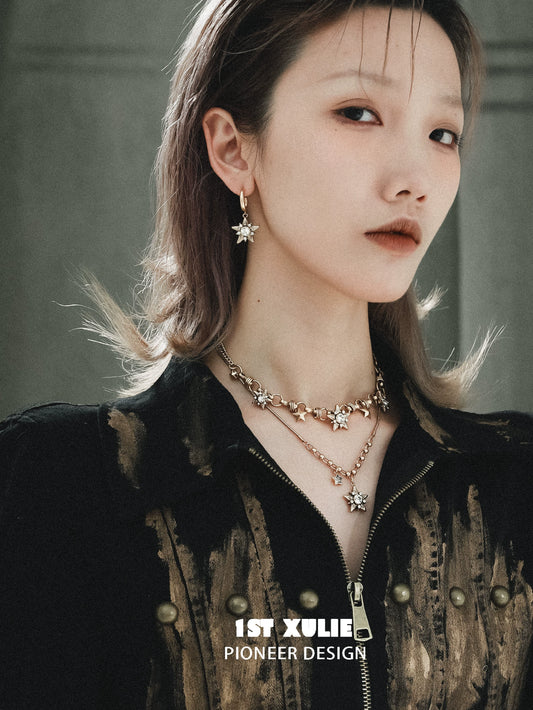 Elegant vintage starlight pendant necklace paired with matching earrings for a sophisticated look