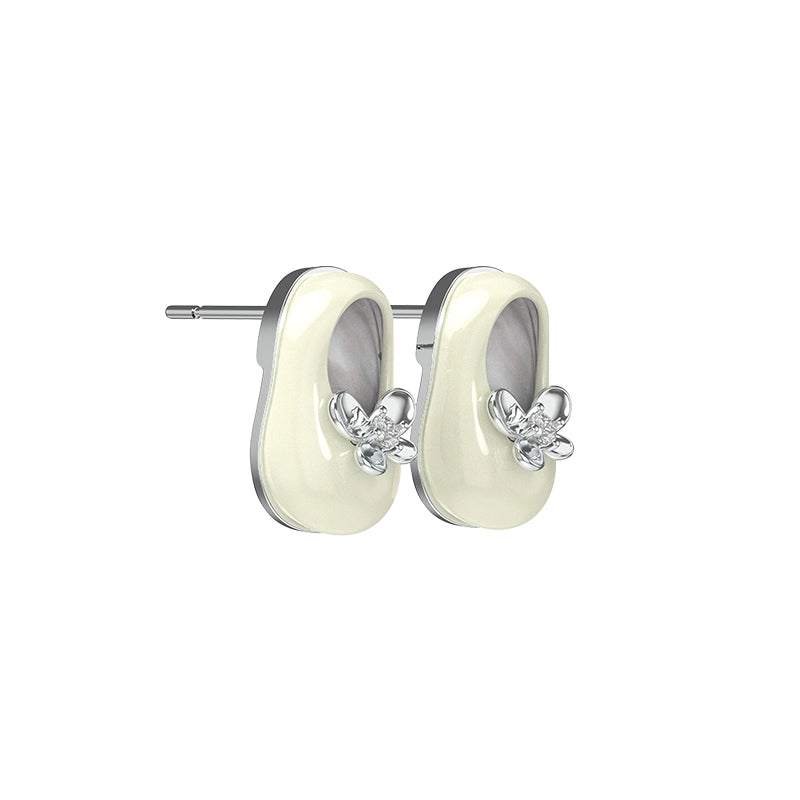 SUN HUNTER vintage walking shoe earrings featuring a floral design and elegant enamel finish