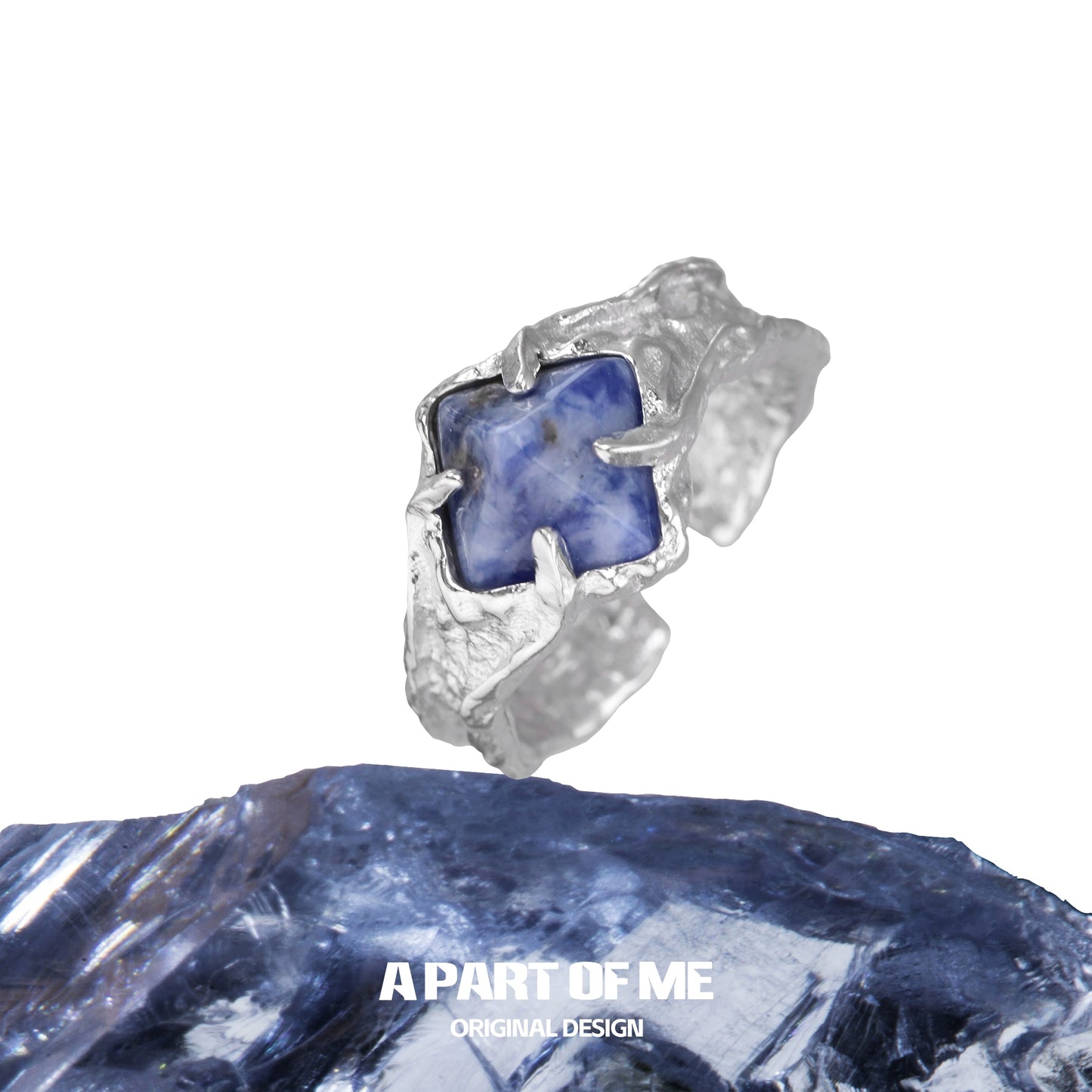 A unique silver ring featuring a stunning violet gemstone ring centered on a textured band