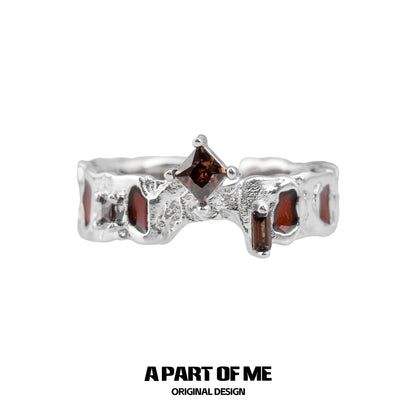 Wasteland diamond ring by A PART OF ME featuring a unique silver design with dark gemstones