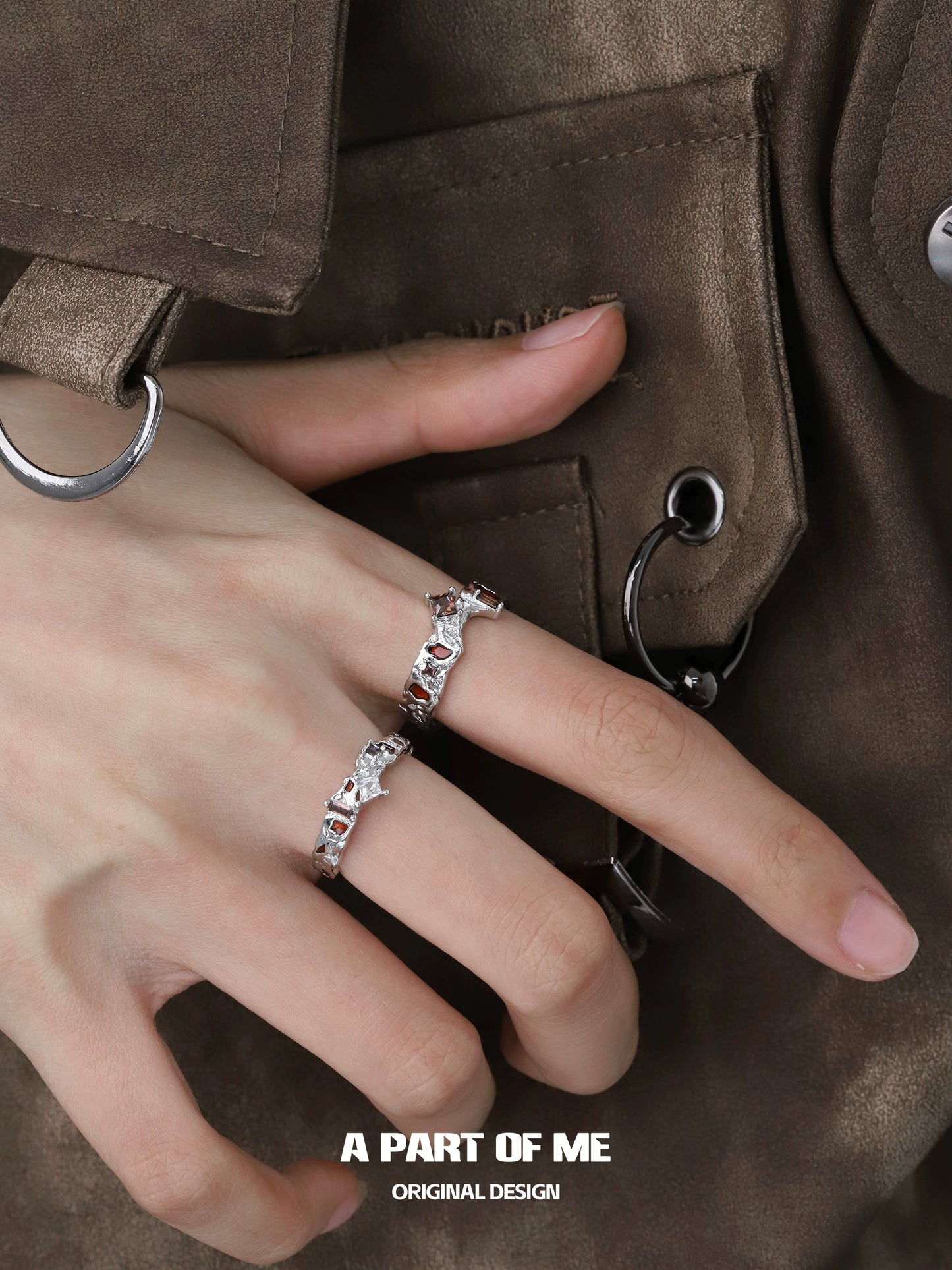 A PART OF ME Wasteland Diamond Ring on a hand, featuring intricate design and sparkling stones