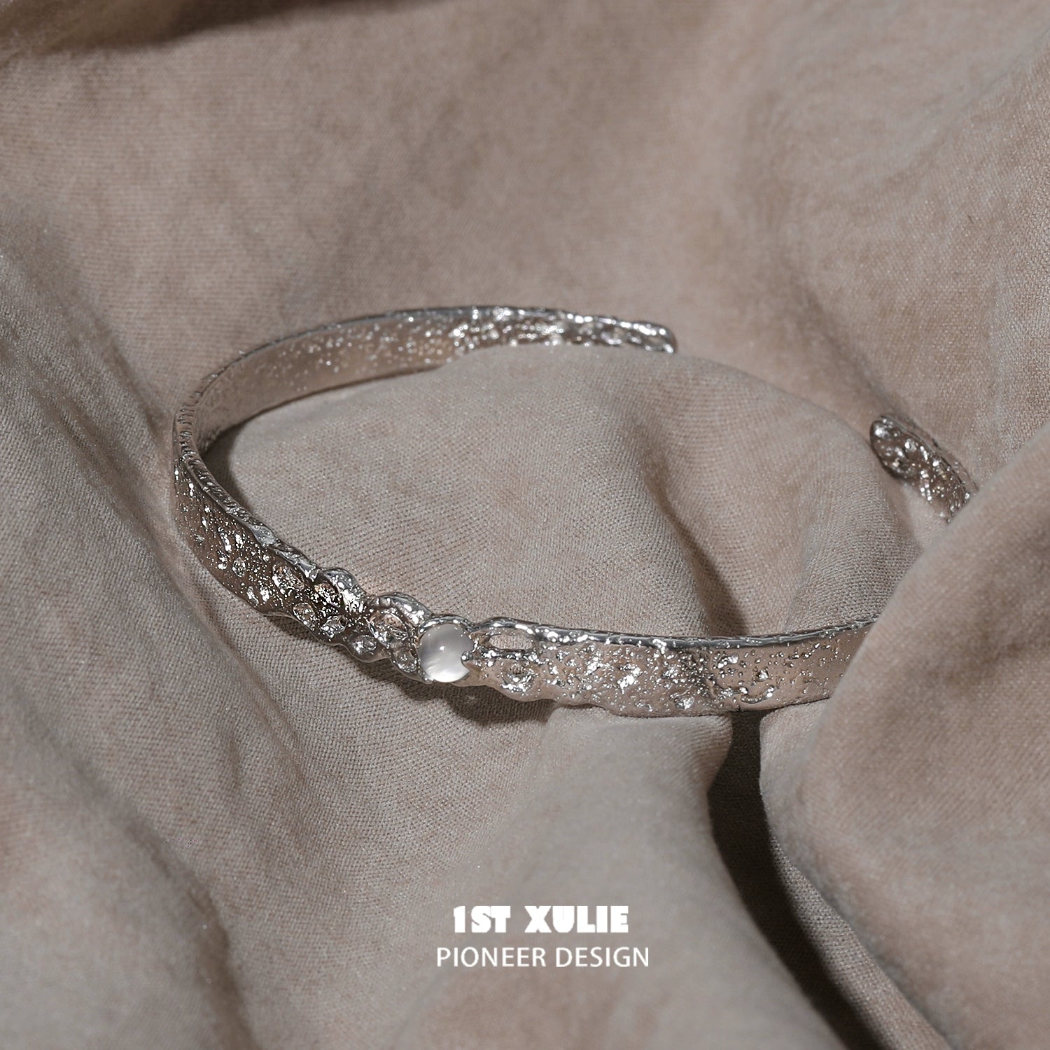 Elegant white agate bangle bracelet with textured silver design for stylish accessories