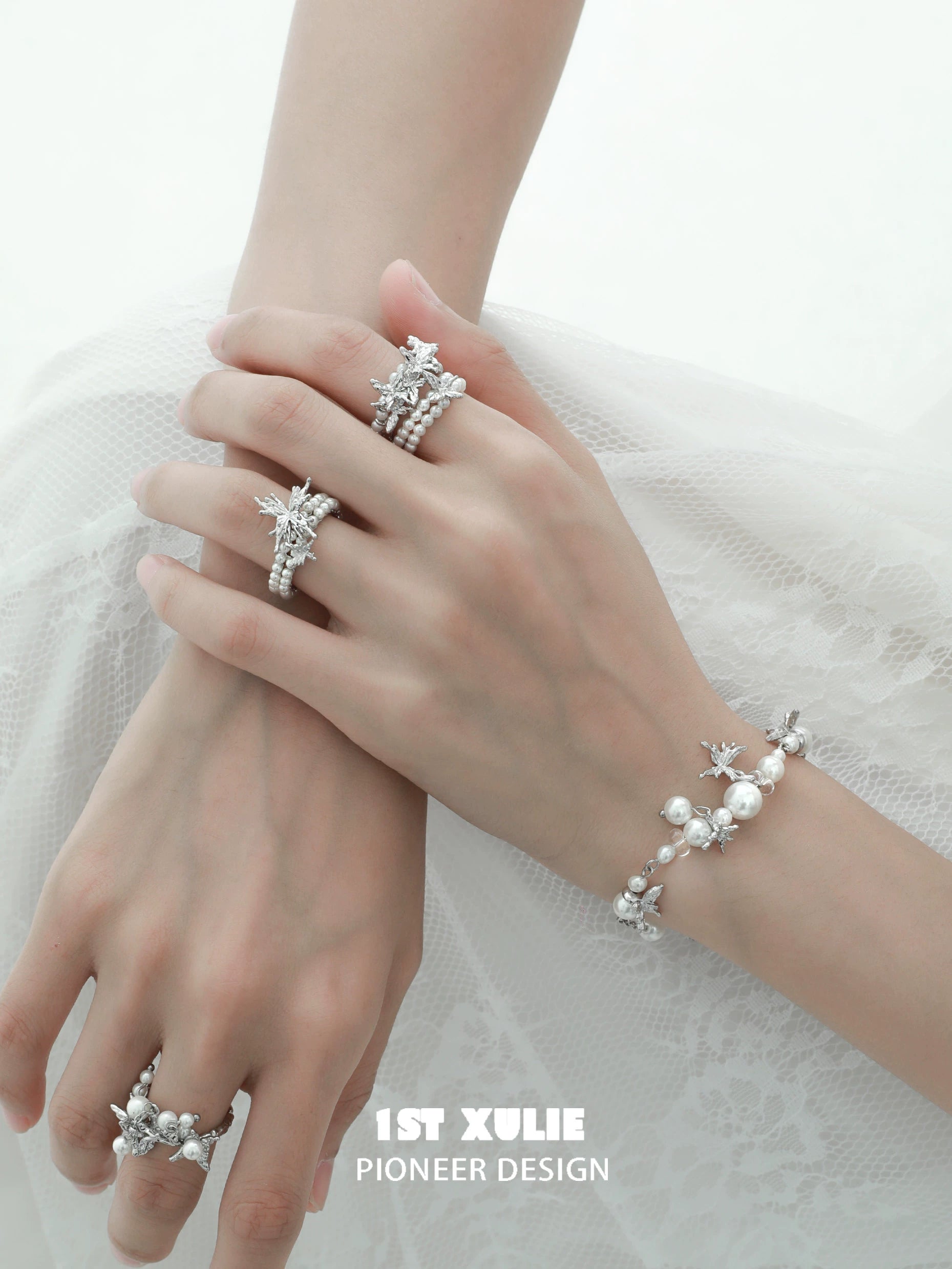 Elegant white butterfly pearl bracelet adorned with shimmering pearls and butterfly accents