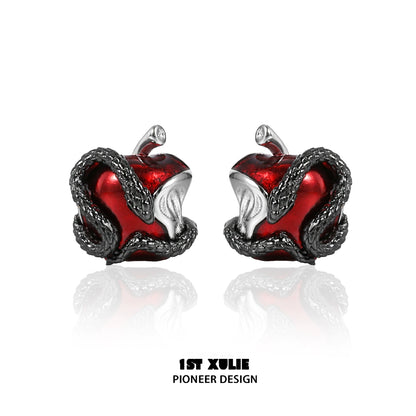 Wicked apple snake ear studs featuring a red apple design with intricate snake detailing