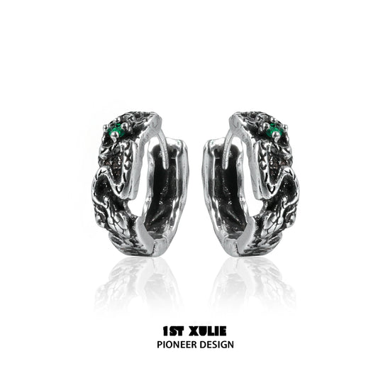 Y2K black snake earrings with intricate design and green accents for a bold fashion statement