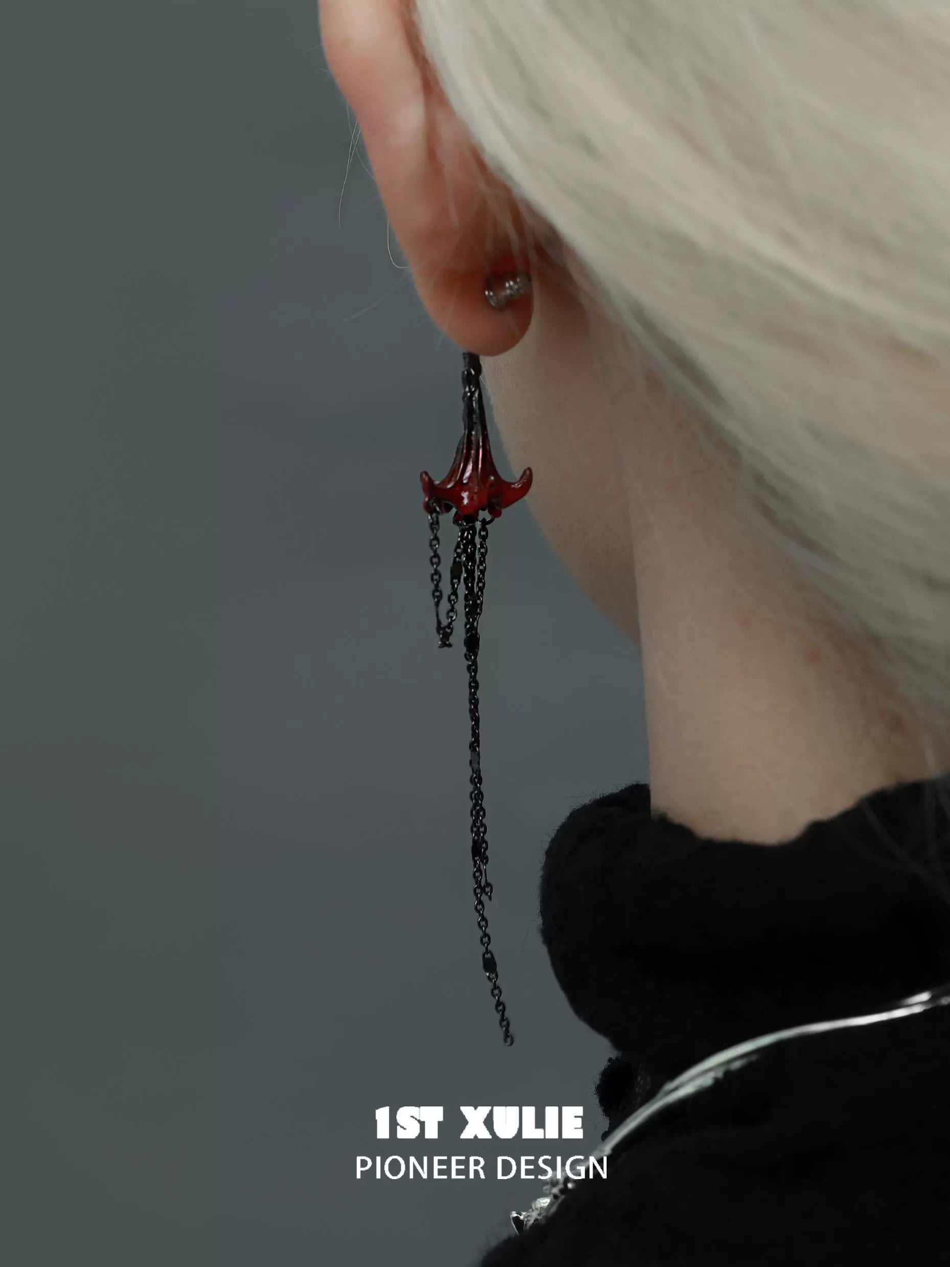 Y2K blood mandala tassel earrings in black and red, adding a stylish touch to any outfit