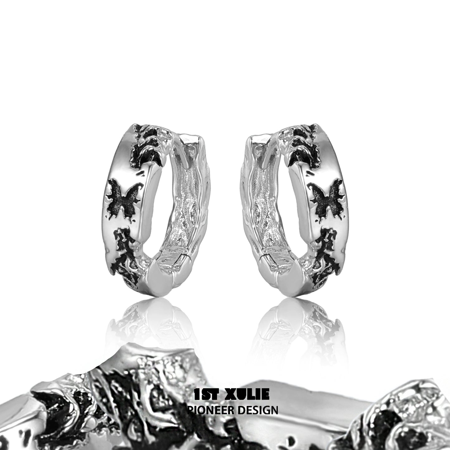 Stylish Y2K butterfly earrings in silver featuring intricate designs and a modern look