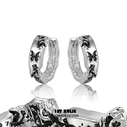 Stylish Y2K butterfly earrings in silver featuring intricate designs and a modern look