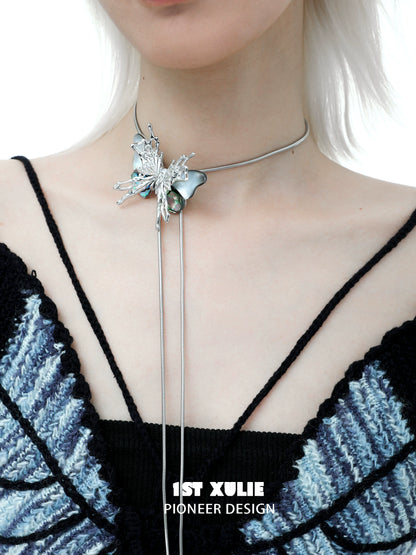 Y2K butterfly necklace with silver accents and a unique design worn on a model