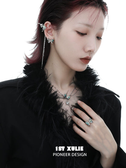 Model wearing Y2K butterfly necklace with matching earrings and ring for a trendy look