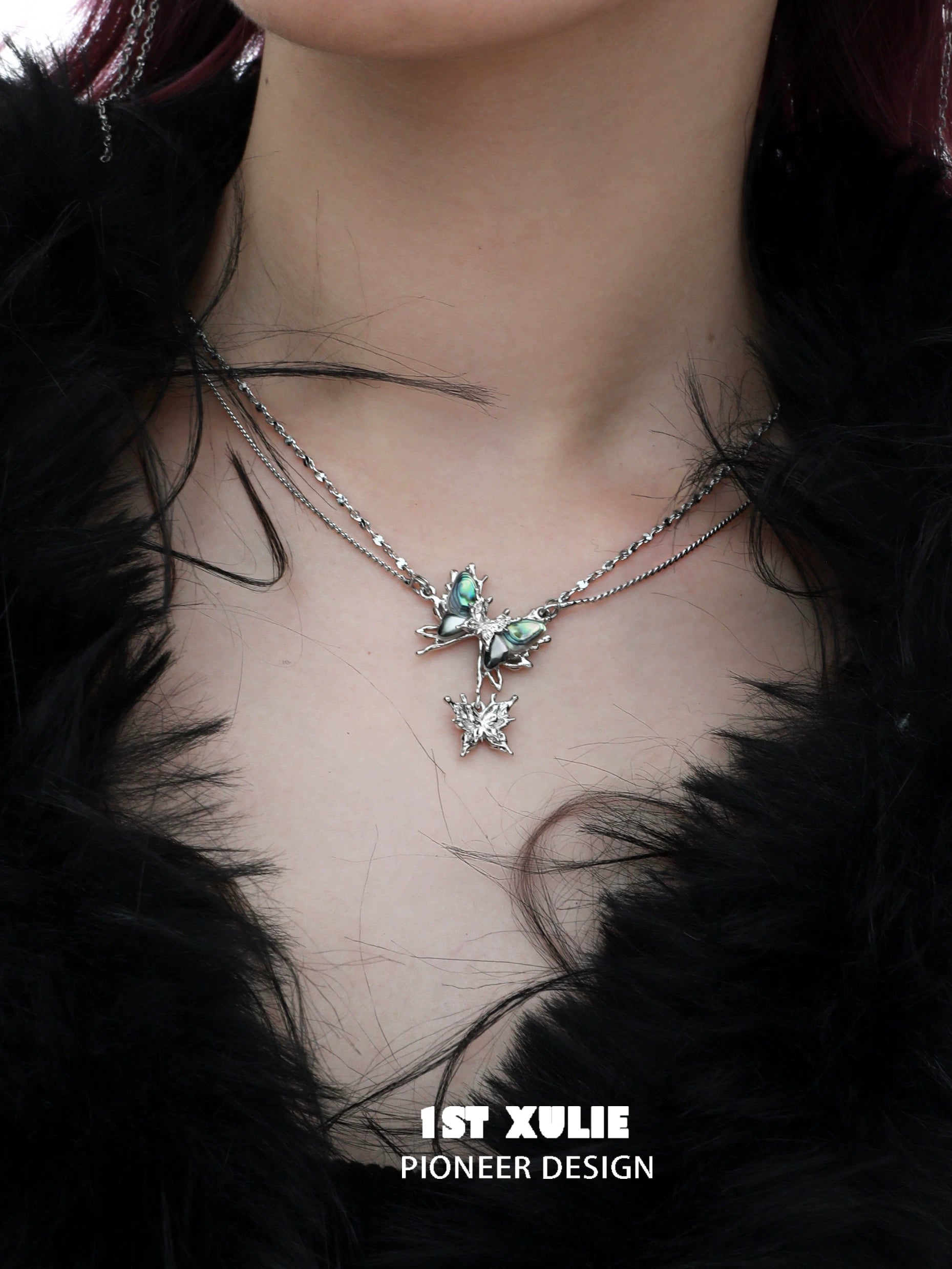 Y2K butterfly necklace from 1ST XULIE with layered silver chains and decorative butterfly charm