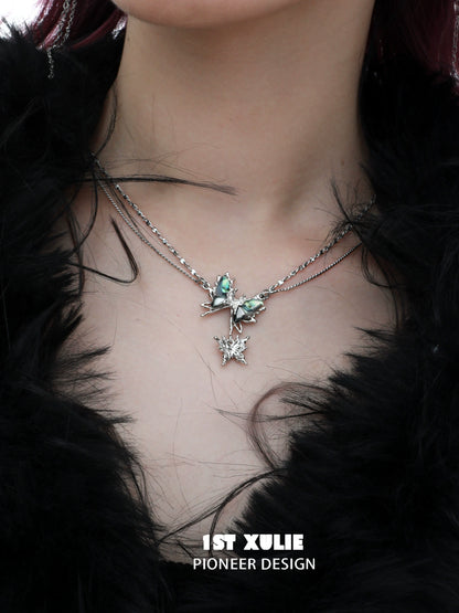 Y2K butterfly necklace from 1ST XULIE with layered silver chains and decorative butterfly charm