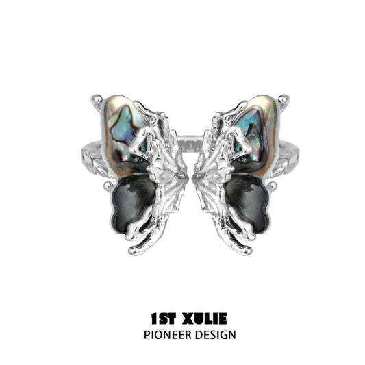 Y2K butterfly silver ring designed with unique abalone and black gemstone accents